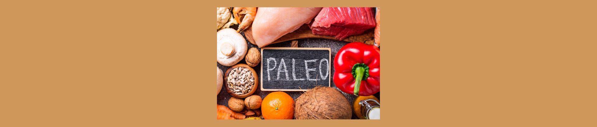Understanding The Paleo Diet: Benefits And Drawbacks Understanding The Paleo Diet Benefits And Drawbacks (2).
Light brown background. Paleo on black chalk board, white chalk. Meat, nuts, fruits, vegies.
